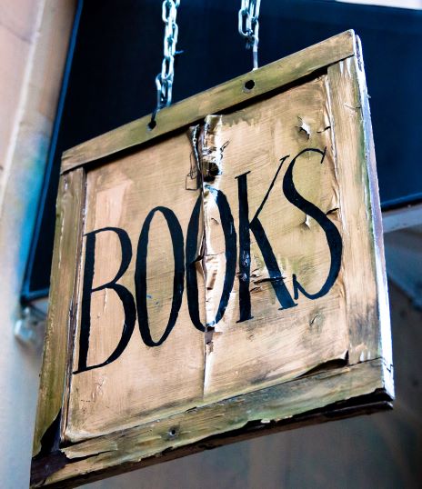 wooden sign saying books