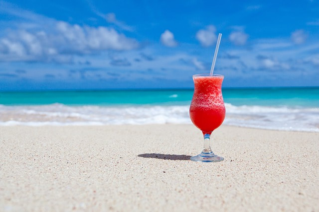 Caribbean beach and red drink