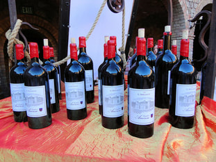photo of 12 bottles of red wine