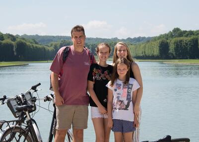 Alan Josephs with three daughters, vacationing in Versailles