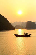 photo of sunset over water in Vietnam